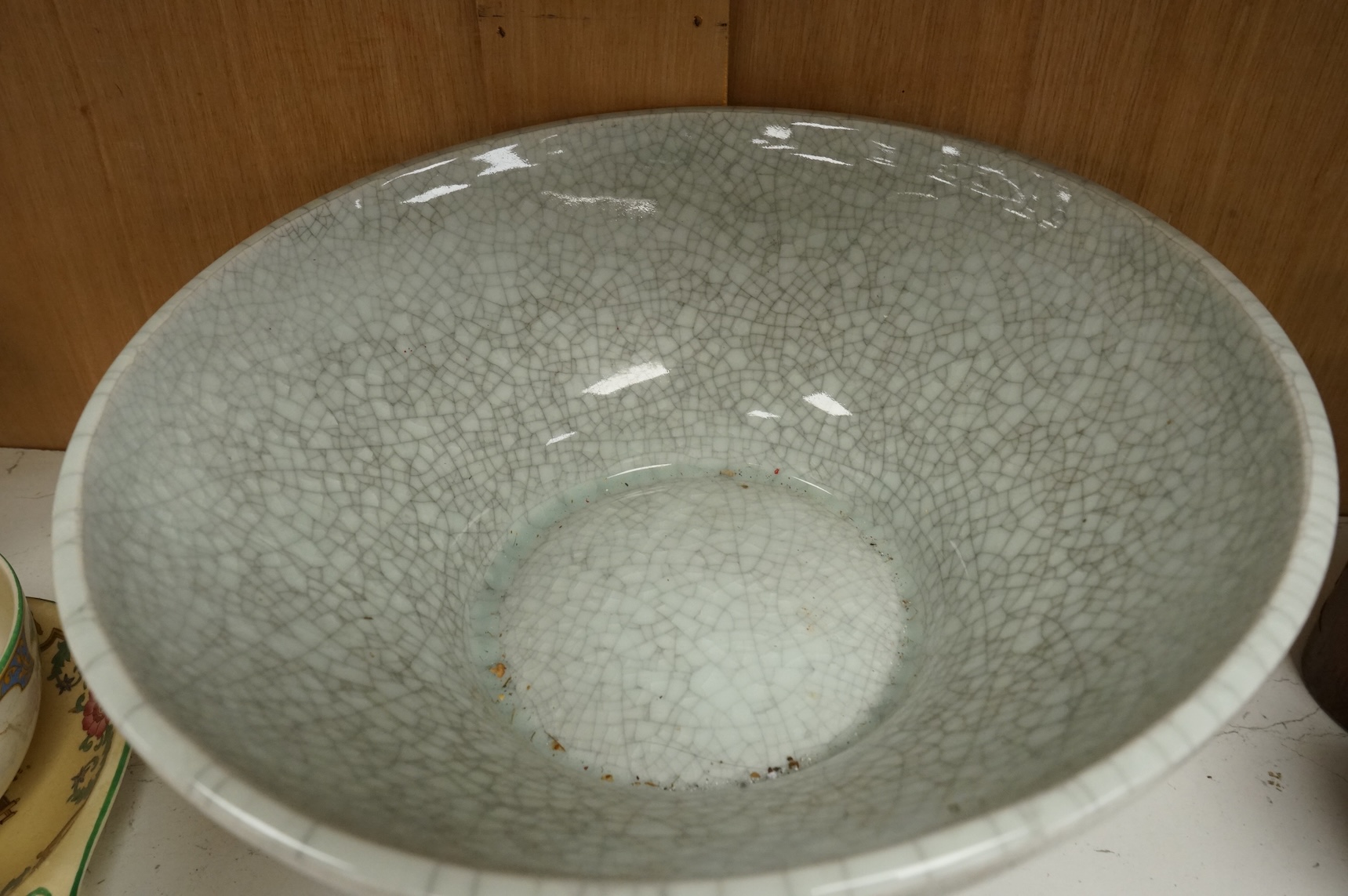 Oriental items to include a crackleglaze bowl on stand and a bamboo brush pot, together with two other vessels, largest 27cm in diameter